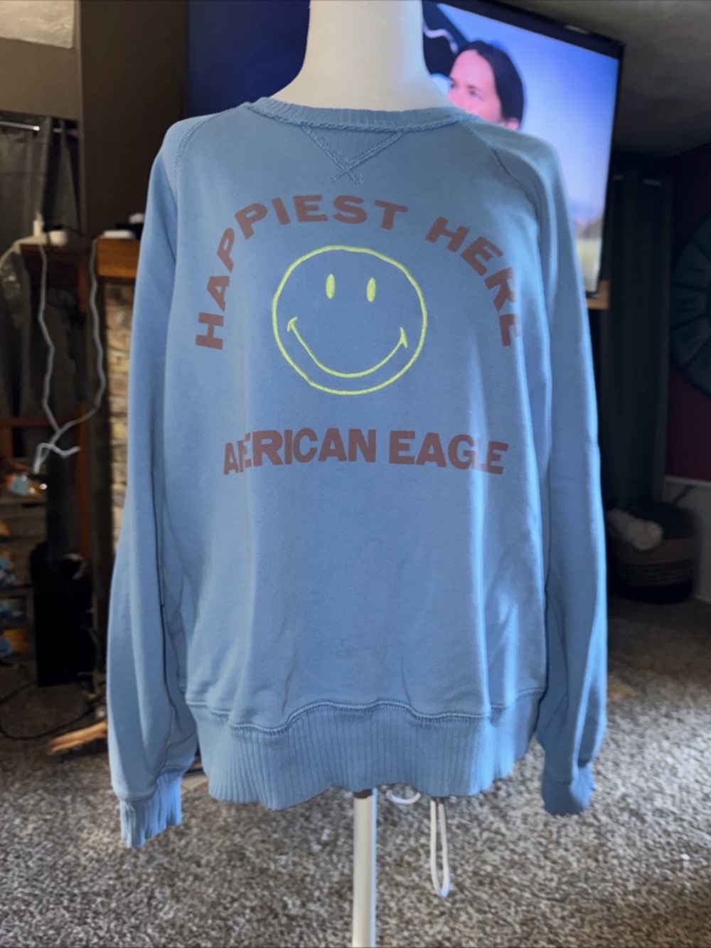 American Eagle Outfitters Light Blue 'Happiest Here' Smiley Sweatshirt